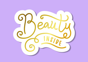 Modern calligraphy lettering of Beauty inside in golden with white outline in paper cut style on purple background for decoration, poster, print, stich, design, psychology, sticker, packaging, presen