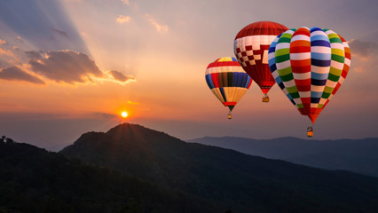 Colorful hot air balloon fly over mountain view 6