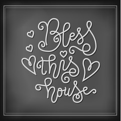 Modern calligraphy lettering of Bless this house in white chalk in mono line style on blackboard background for decoration, postcard, poster, banner, print, design element, interior decoration