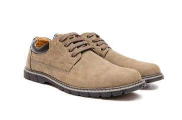 Brown suade shoes isolated on white background