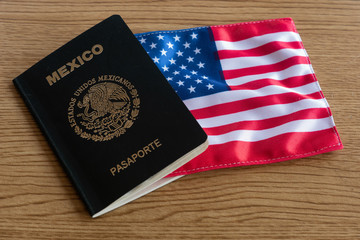 Mexican passport and american flag