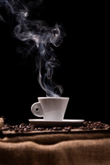 Close up black hot coffee cup and smoke