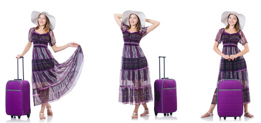 Young woman with suitcase isolated on white 