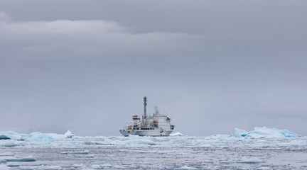small boat in antartic waters