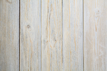The wooden vertical background under old times of white color.