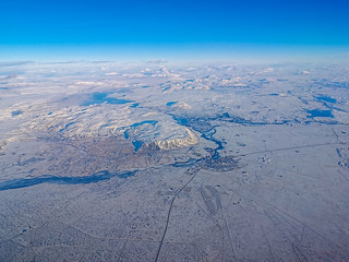 Aerial view in winter of the population of Selfoss and the river &Ouml;lfus&aacute;, in Iceland