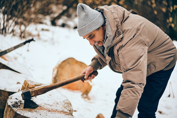 Senior man working in a personal lumber yard