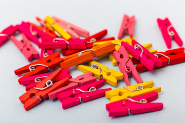 Plastis clothesspins isolated on white background