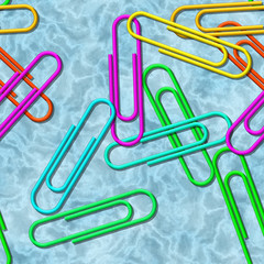 A group of paper clips on background