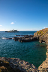 lighthouse at sunset in Cornwall