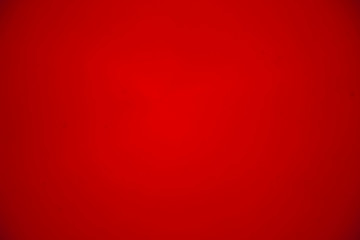 Red gradient background. Red texture. Christmas background. Monochrome background. Abstraction and...