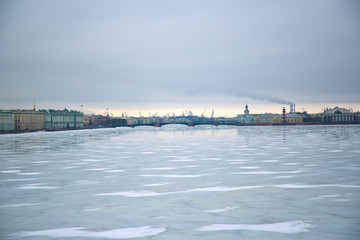 view of the frozen river from the bridge
