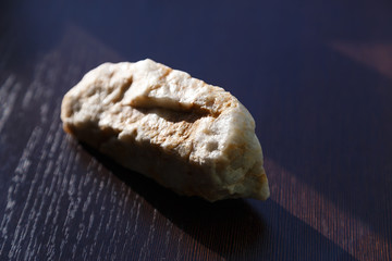 Stone granite. A fragment of stone