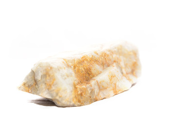 a piece of natural marble on an isolated white background