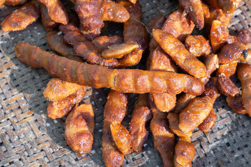 wet fresh tamarind on bamboo basket