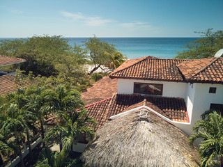 Fototapeta na wymiar Red roof of luxury villa