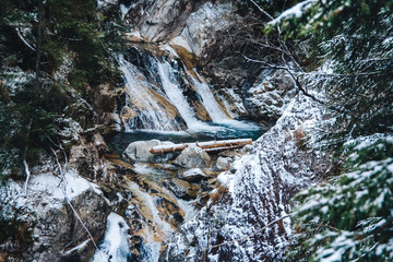 Winter spring fed creek waterfalls in the winter