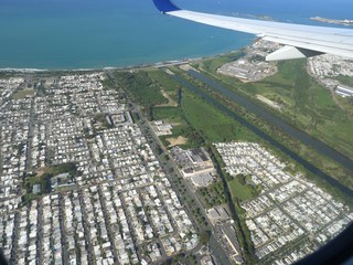 Aerial view of the business districts of San Juan Puerto Rico, seen from an airplane window.