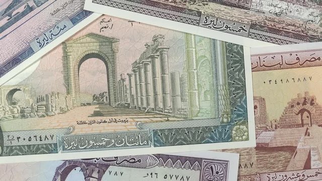 Old Lebanon pound banknotes slow rotating. Lebanese money currency. Lebanon economy. 4K stock video footage.