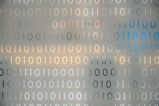 Binary code on glass background