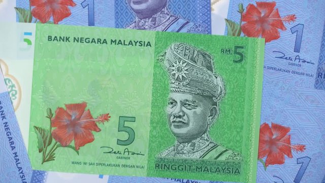 Malaysia currency ringgit notes slow rotating. Malaysian money. 4K stock video footage