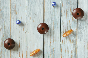 pattern of beads on a light blue background top view