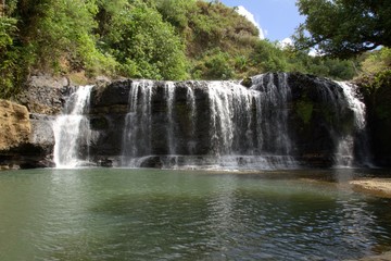 Wide shot of the 30-foot Talafofo Falls in the southern part of Guam, United States