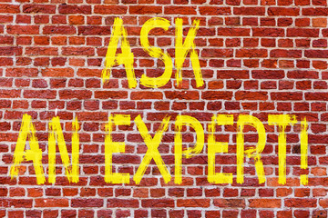 Fototapeta na wymiar Writing note showing Ask An Expert. Business photo showcasing Consult a Professional Asking for Advice Make a Question Brick Wall art like Graffiti motivational call written on the wall