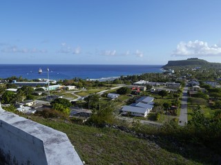 Overlooking Songsong village with the Cake Mountain in the distance facing the ocean, Rota, Northern Mariana Islands.