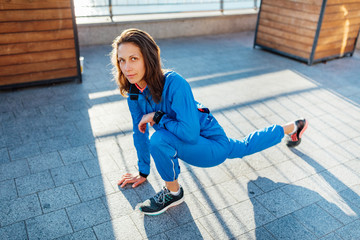 Young woman stretching before jogging exercise