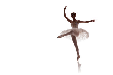 woman ballerina in white pack posing on white background photo made in the style of "low key" © Kozlik_mozlik