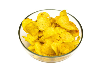 potato chips with spices in a glass bowl on a white background