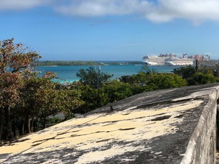 Flat top of the strong walls of Fort Charlotte in Nassau, Bahamas with an old cannon in the picture.