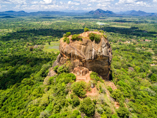 Aerial view from above of Sigiriya or the Lion Rock, an ancient fortress and a palace with gardens,...