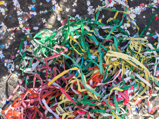 Pavement covered with colorful streamers