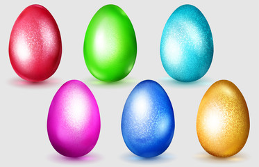 Set of realistic multicolored Easter eggs with glares and soft shadows on white background