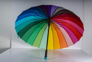 round multi-colored umbrella, rainbow color