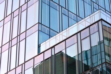 The windows of a modern building for offices. Business buildings architecture.