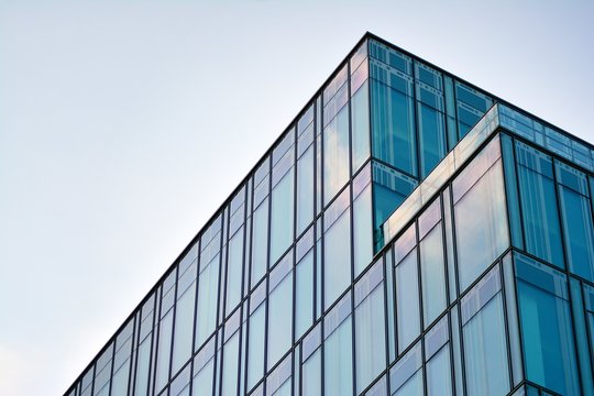 The windows of a modern building for offices. Business buildings architecture.