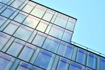 The windows of a modern building for offices. Business buildings architecture.