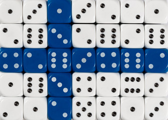 National flag of Finland in background of dices
