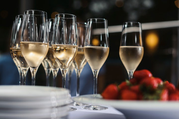Glasses with champagne or wine at the event. Catering concept
