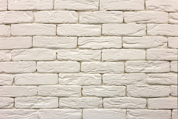 Close-up of white painted whitewashed solid brick wall. Abstract copy space background,...