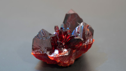 Natural raw red crystal. Natural red precious mineral stone