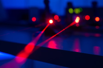 Experiment with a red laser in a physics lab