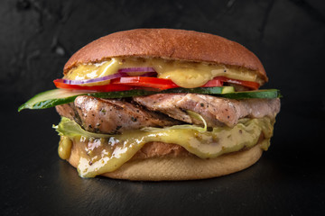 Juicy fresh delicious hamburger with grilled chicken or turkey fillet. The burger menu.