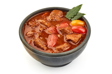 Goulash traditional homemade European beef meat stew soup, Hungarian bograch, close-up, isolated on white background