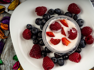 Yogurt with strawberries and blueberries