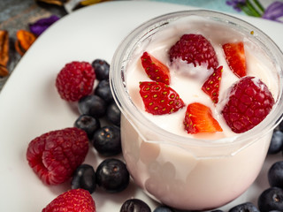 Yogurt with strawberries and blueberries