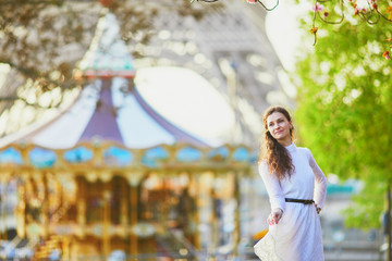 Woman enjoying cherry blossom season in Paris, France